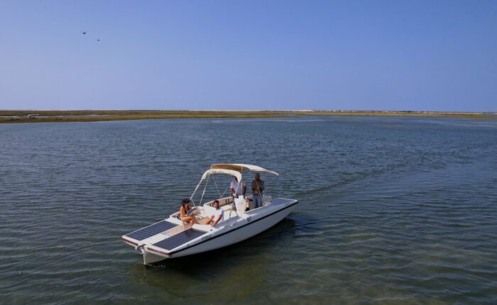 Guests enjoying the Ria Formosa Eco Boat Tour, surrounded by the natural beauty of Faro's coastal waters.