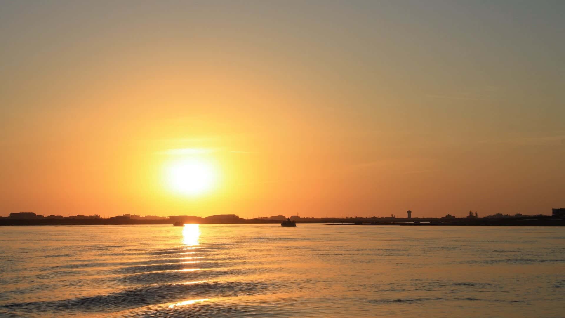 Experience a beautiful boat trip at sunset around Faro.